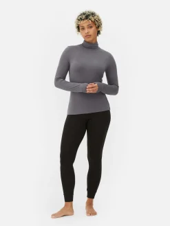 Camiseta De Manga Larga Con Cuello Vuelto