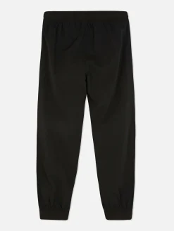 Joggers De Popelina Con Bajos Ajustados