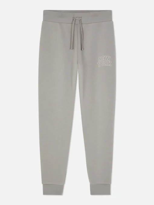 Pantalones De Chándal Pitillo Con Estampado Gráfico